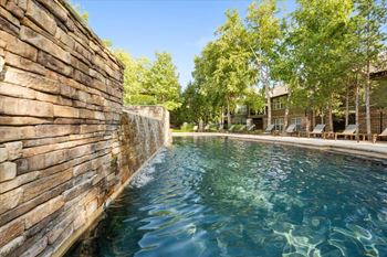 Resort inspired crystal clear swimming pool